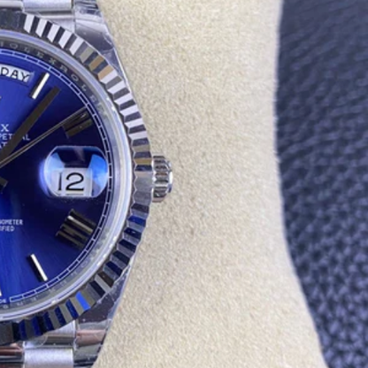RLX Day-Date 40 in 18k white gold with a blue dial and fluted bezel